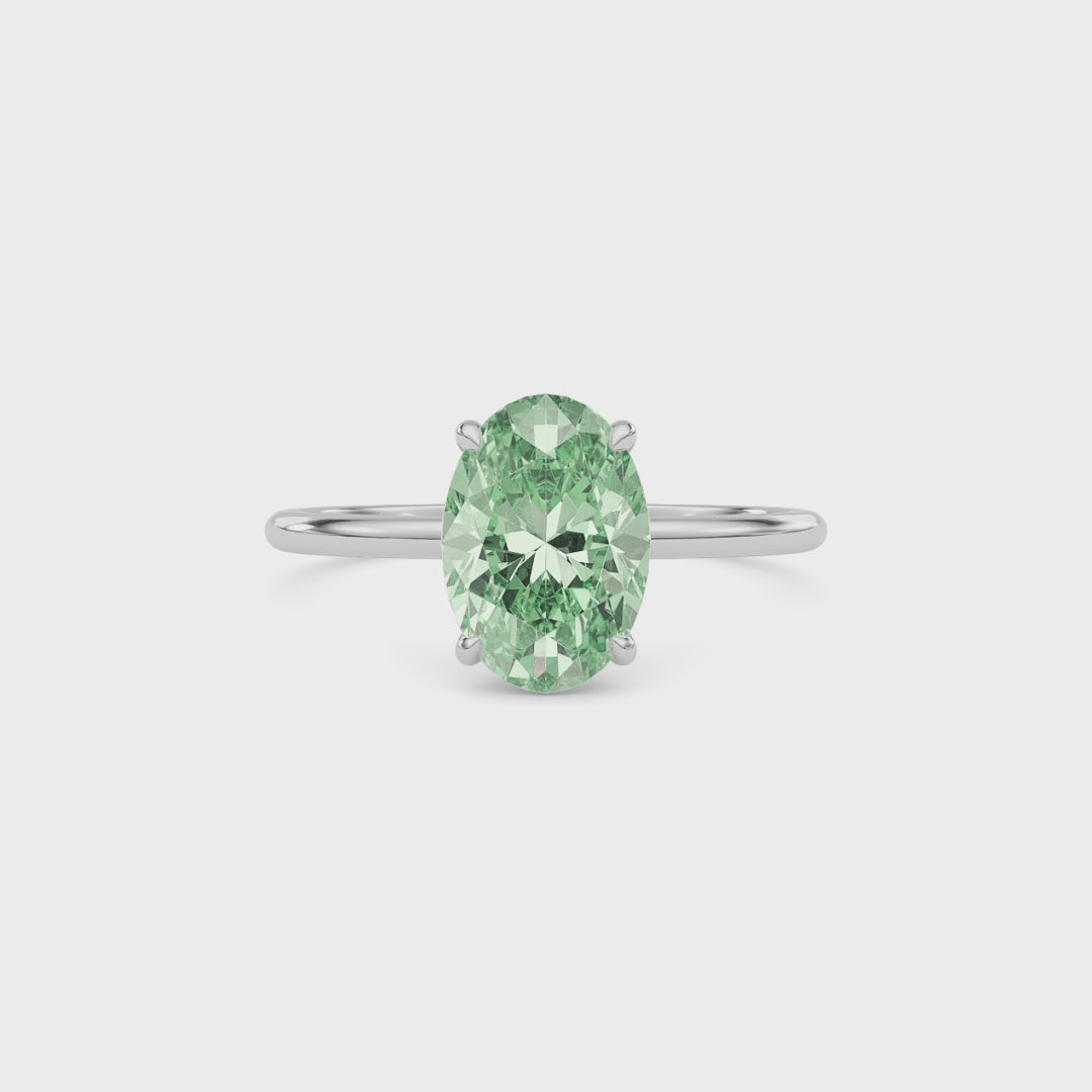 Platinum Fancy Green Oval Cut Diamond Hidden Halo Solitaire Engagement Ring with Prong Setting