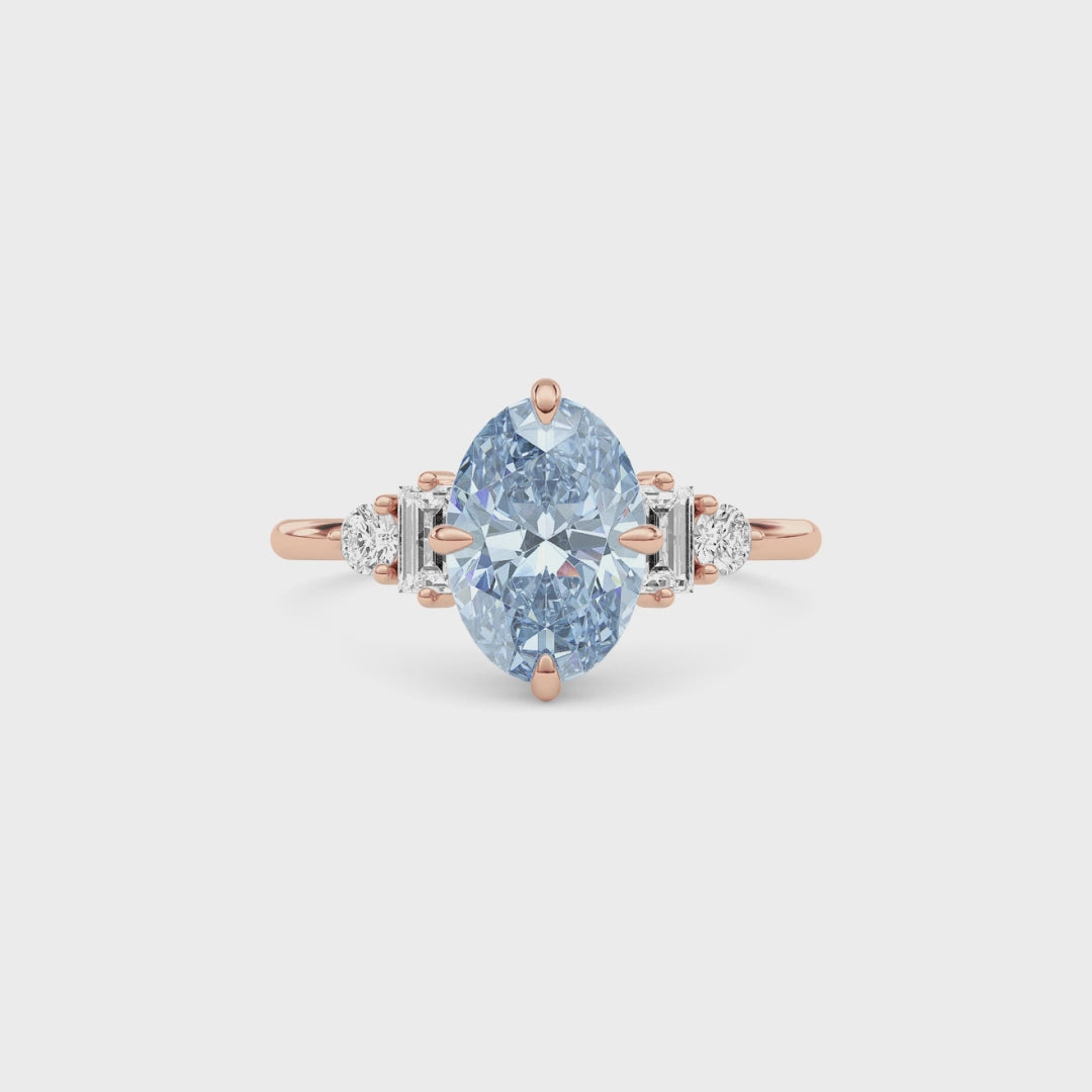 Rose gold Fancy Blue Oval Cut Three Stone Diamond Engagement Ring with Tapered Baguette and Round Side Stones