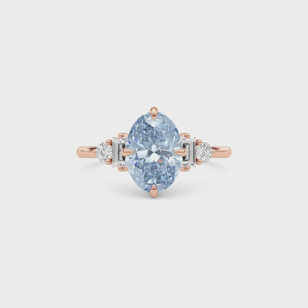 Rose gold Fancy Blue Oval Cut Three Stone Diamond Engagement Ring with Tapered Baguette and Round Side Stones