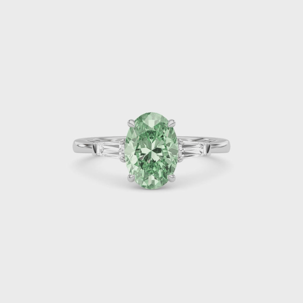 White gold Three-Stone Fancy Green Oval Cut Diamond Ring with Tapered Baguette Side Stones