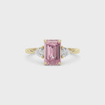 Yellow gold Three-Stone Fancy Pink Emerald Cut Diamond Ring with Trillion Side Stones