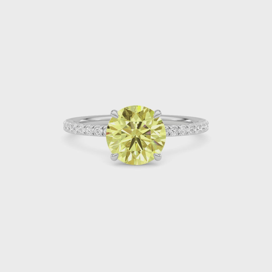 Yellow gold Fancy Yellow Round Cut Diamond Solitaire with Pavé Band