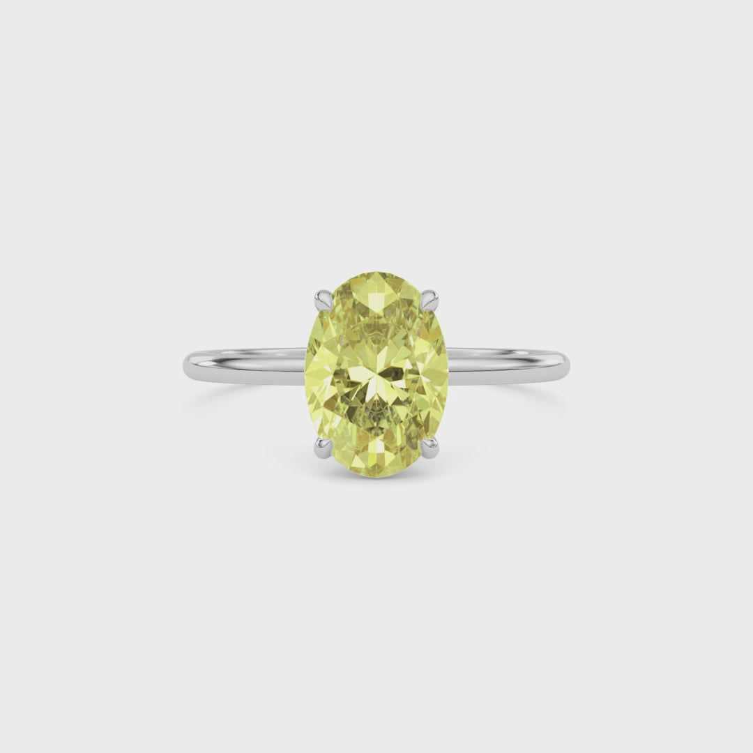 Yellow gold Fancy Yellow Oval Cut Diamond Hidden Halo Solitaire Engagement Ring with Prong Setting