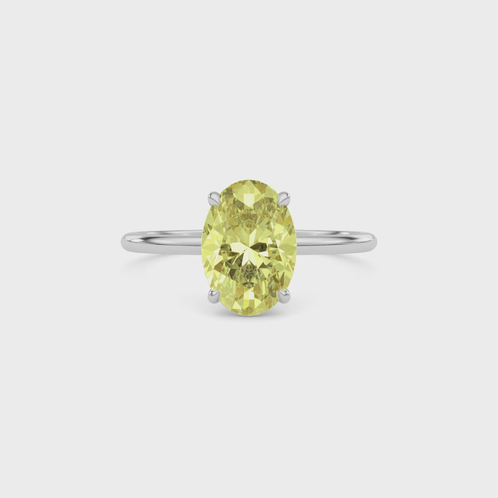 Yellow gold Fancy Yellow Oval Cut Diamond Hidden Halo Solitaire Engagement Ring with Prong Setting