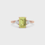 Rose gold Three-Stone Fancy Yellow Emerald Cut Diamond Ring with Trillion Side Stones