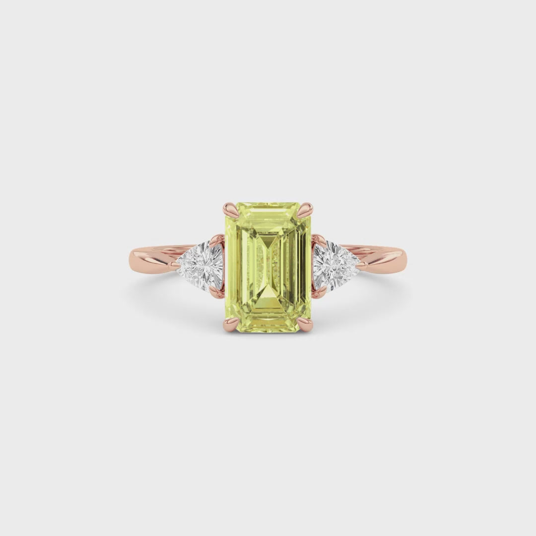 Rose gold Three-Stone Fancy Yellow Emerald Cut Diamond Ring with Trillion Side Stones