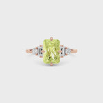 Rose gold Fancy Yellow Radiant Cut Three Stone Diamond Engagement Ring with Tapered Baguette and Round Side Stones