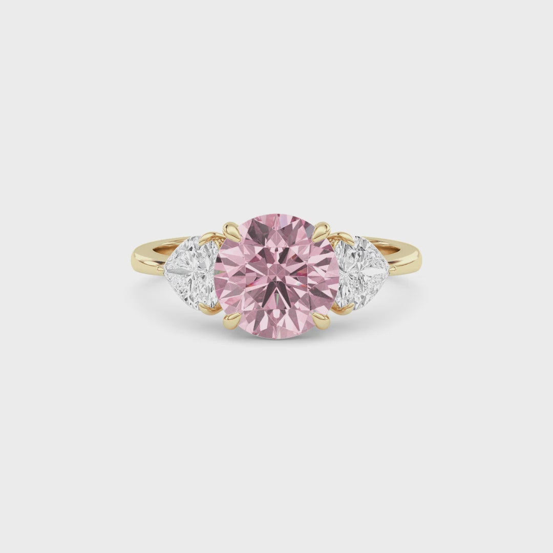 Yellow gold Three-Stone Fancy Pink Round Cut Diamond Ring with Heart Side Stones