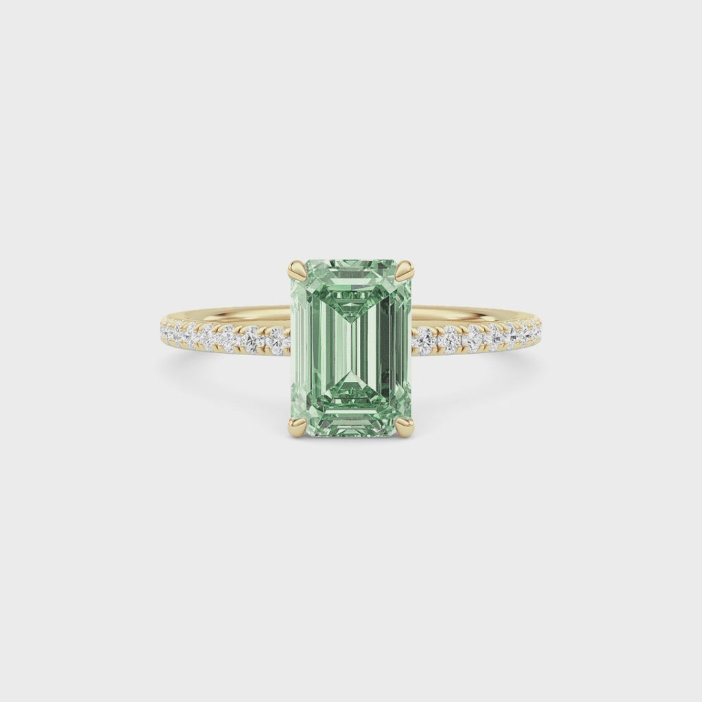 Yellow gold Fancy Green Emerald Cut Diamond Solitaire with Pavé Band