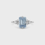 Platinum Fancy Blue Emerald Cut Three Stone Diamond Engagement Ring with Tapered Baguette and Round Side Stones