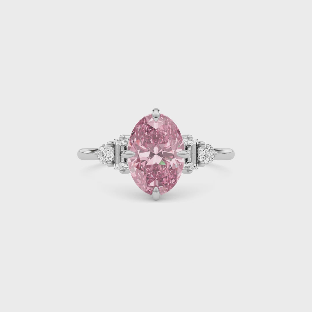 White gold Fancy Pink Oval Cut Three Stone Diamond Engagement Ring with Tapered Baguette and Round Side Stones