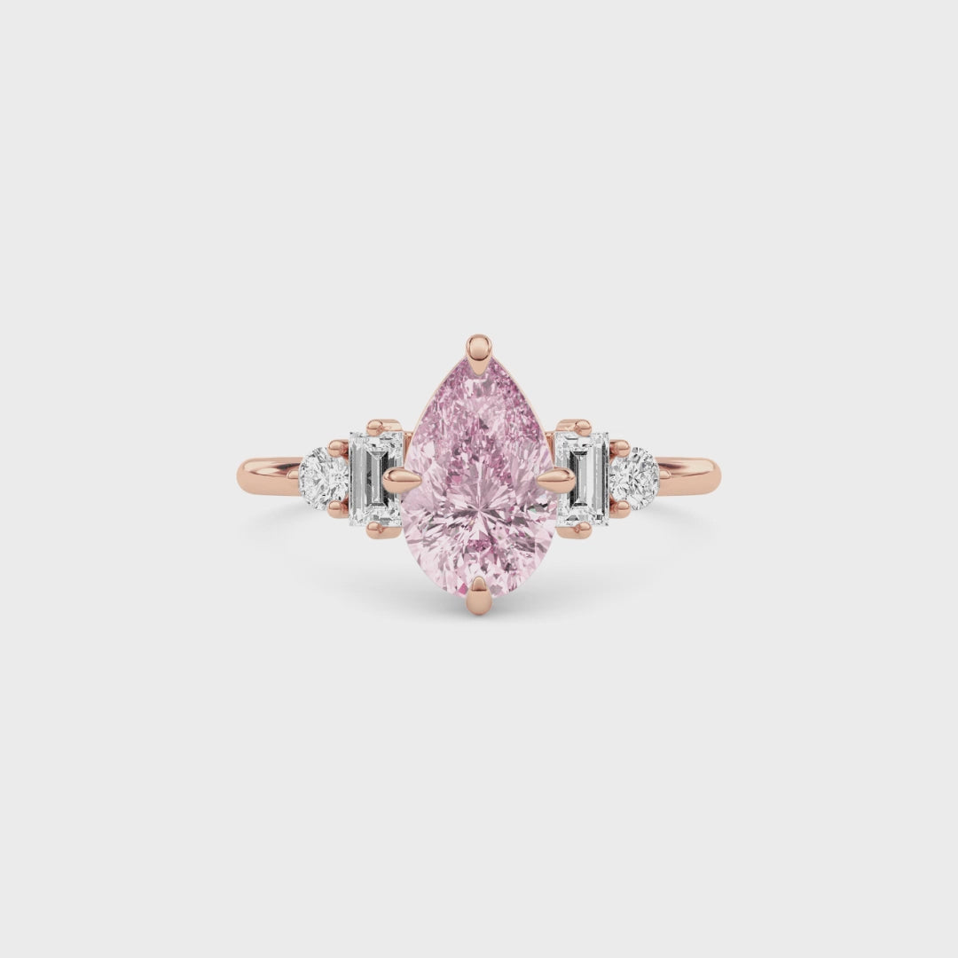 Rose gold Fancy Pink Pear Cut Three Stone Diamond Engagement Ring with Tapered Baguette and Round Side Stones