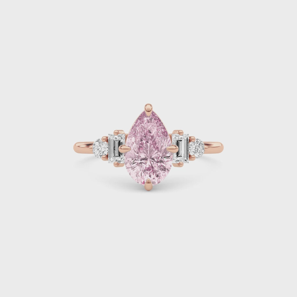 Rose gold Fancy Pink Pear Cut Three Stone Diamond Engagement Ring with Tapered Baguette and Round Side Stones