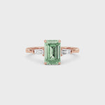 Rose gold Three-Stone Fancy Green Emerald Cut Diamond Ring with Tapered Baguette Side Stones