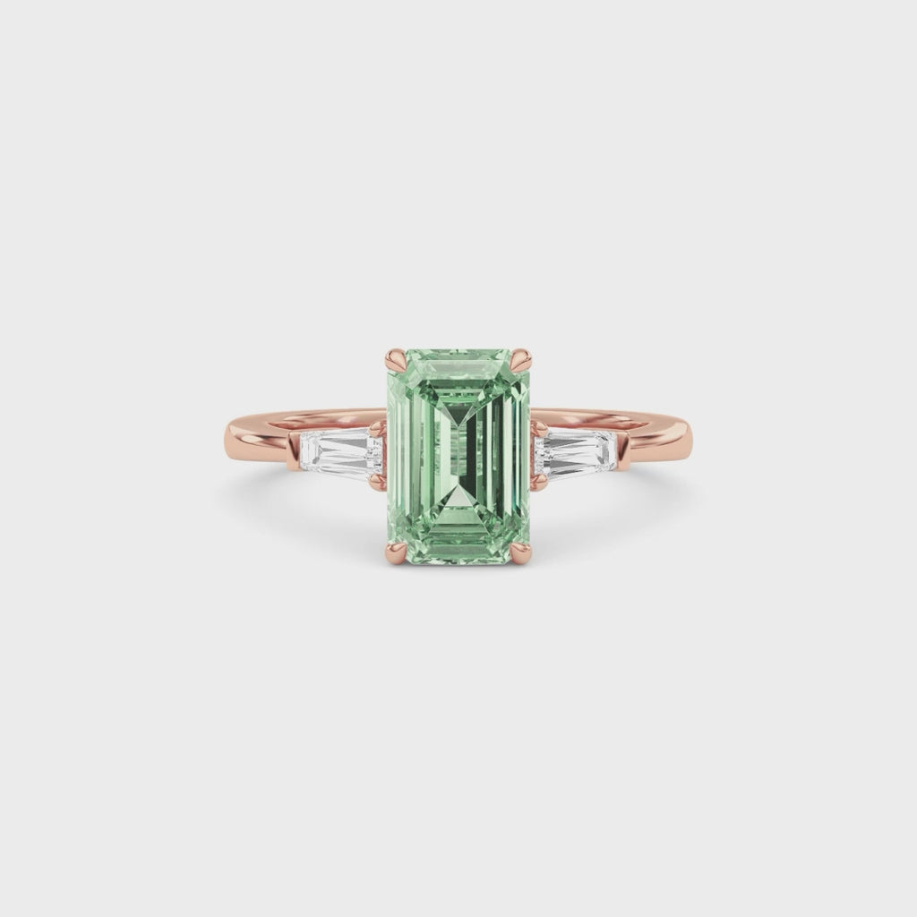 Rose gold Three-Stone Fancy Green Emerald Cut Diamond Ring with Tapered Baguette Side Stones