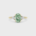Yellow gold Three-Stone Fancy Green Oval Cut Diamond Ring with Trillion Side Stones