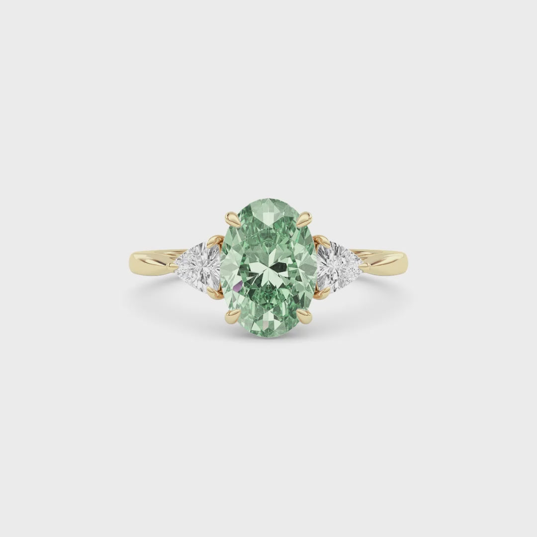 Yellow gold Three-Stone Fancy Green Oval Cut Diamond Ring with Trillion Side Stones