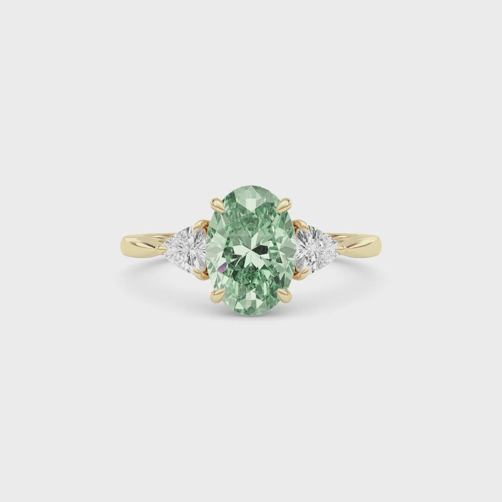 Yellow gold Three-Stone Fancy Green Oval Cut Diamond Ring with Trillion Side Stones